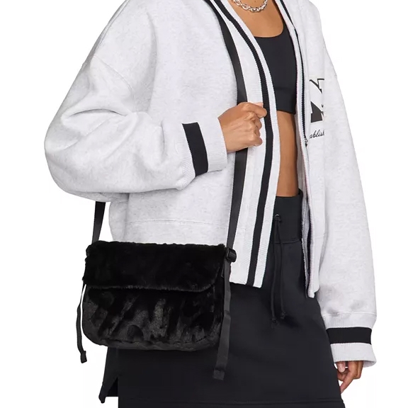 Nike Faux-Fur Crossbody Bag with a plush, fur-like texture in black, adjustable strap for versatile wear, and a casual, chic style ideal for casual or sporty outfits.
