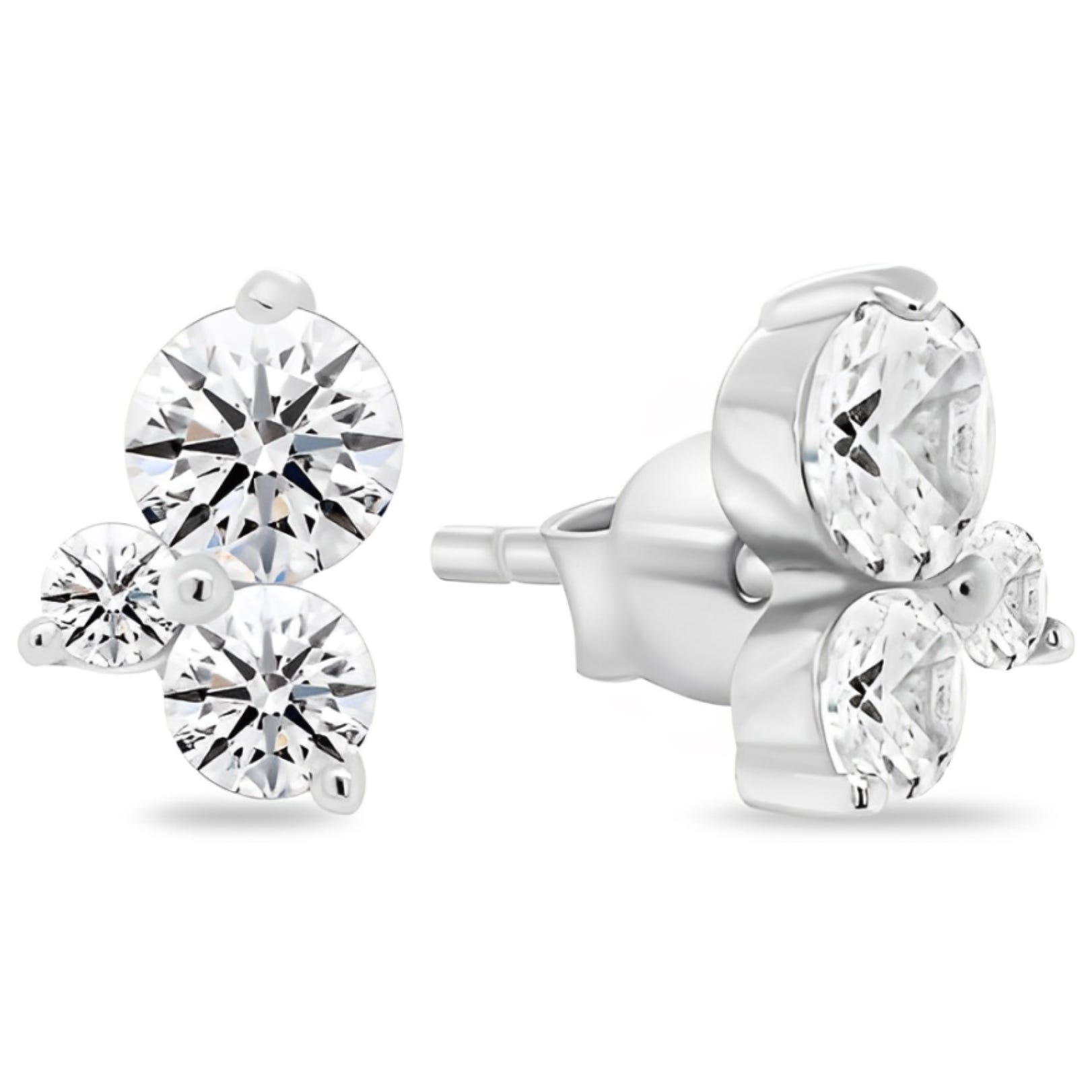 Silver stud earrings featuring three round, clear gemstones in a triangular cluster design.