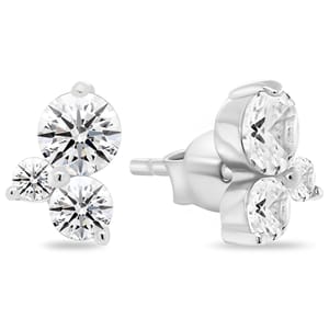 Silver stud earrings featuring three round, clear gemstones in a triangular cluster design.