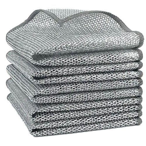 Stack of silver metallic scrub pads with a textured, mesh-like surface for cleaning purposes.