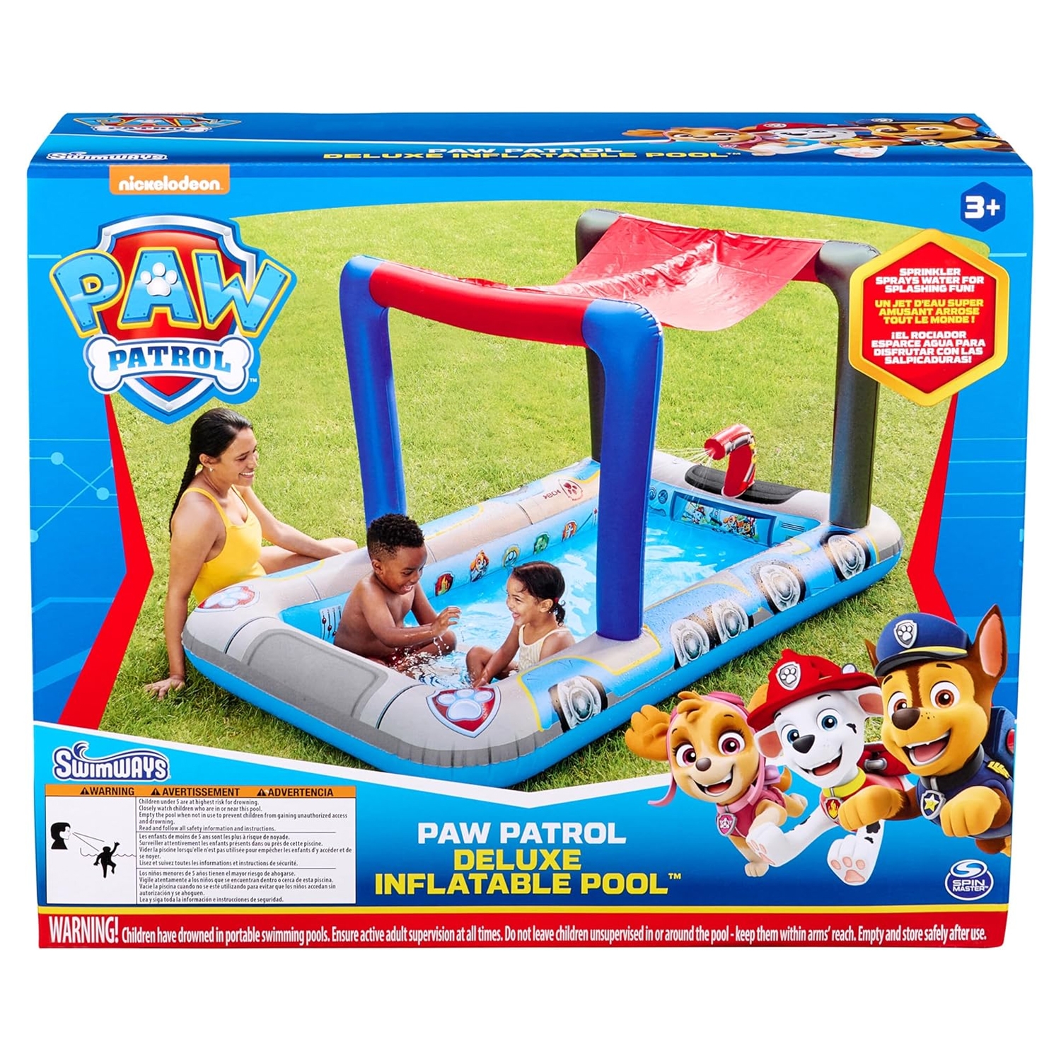 SwimWays Paw Patrol Deluxe Inflatable Pool features a shaded area and sprinkler spray with Paw Patrol characters on the sides. Suitable for ages 3 and up, it offers a playful and shaded water experience.