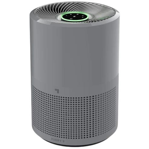 A cylindrical air purifier with a top fan and digital display, featuring a perforated design at the bottom for air intake.