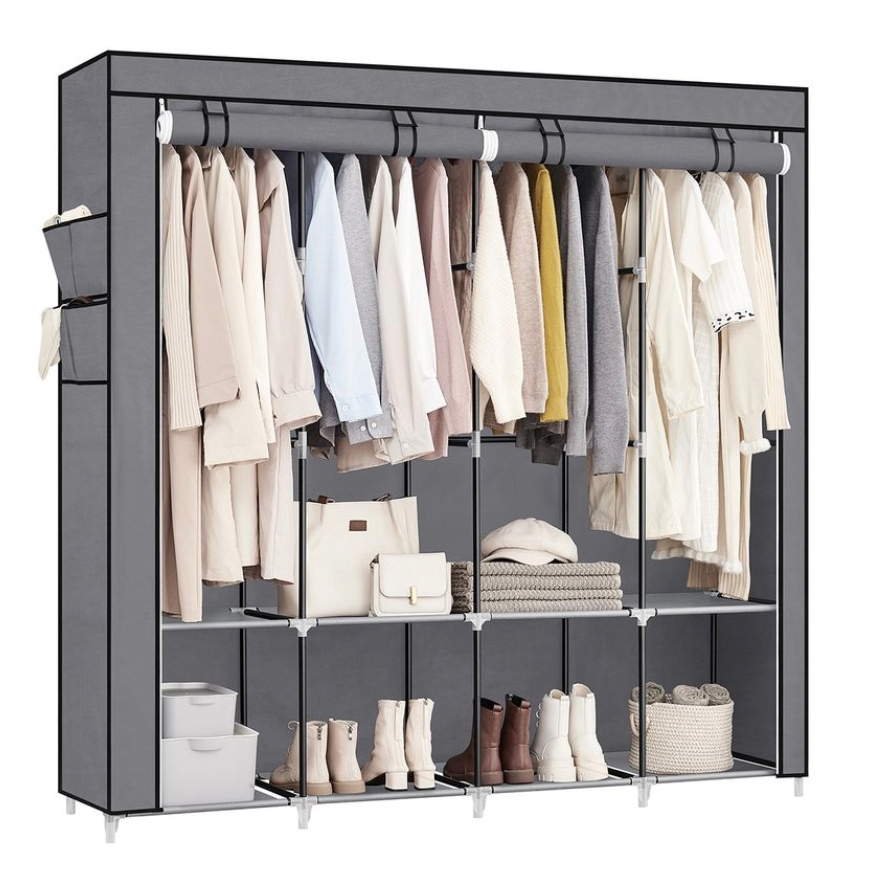 Portable wardrobe with a gray fabric cover, featuring hanging clothes, shelves with handbags, folded items, and boots.
