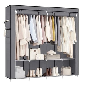 Portable wardrobe with a gray fabric cover, featuring hanging clothes, shelves with handbags, folded items, and boots.