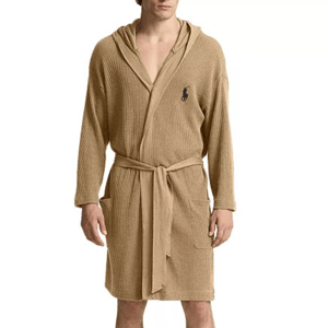 A beige waffle-knit hooded robe with a belted waist and two front pockets, featuring an embroidered logo on the chest.