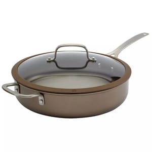 This is a deep skillet with a long handle, two shorter side handles, and a glass lid, finished in a matte brown color.