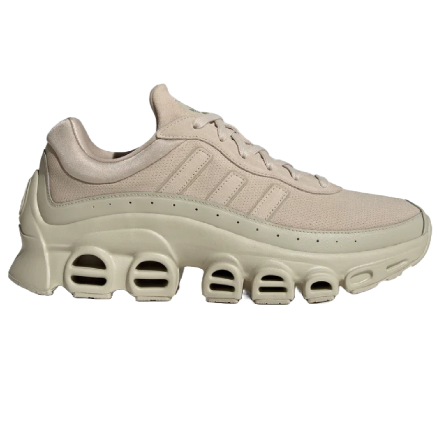 Adidas Adifom Megaride Shoes are beige athletic sneakers featuring a perforated upper, three side stripes, and a unique cushioned sole with hollow arches for enhanced comfort and flexibility.