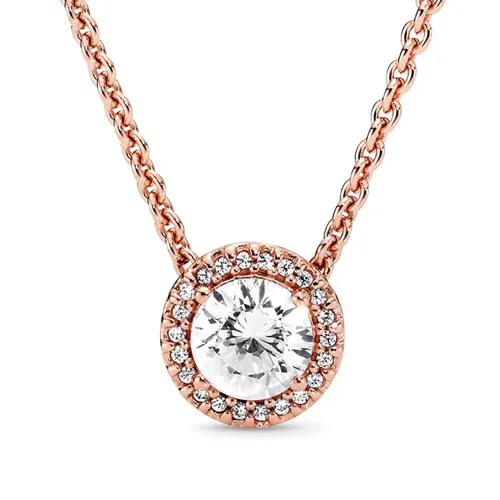 A rose gold necklace featuring a central round-cut gemstone surrounded by a halo of smaller stones, all set in a chain.