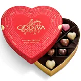 Heart-shaped box of assorted chocolates from Godiva's Limited Edition Hearts Collection. Box design features \“I Love You\“ in multiple languages and a red and gold color scheme.