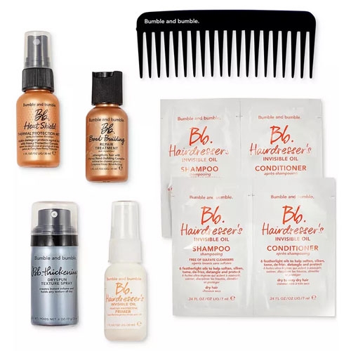 Bumble and bumble hair care set includes a heat shield spray, bond-building serum, thickening spray, Invisible Oil primer, shampoo, conditioner, and a wide-tooth comb.