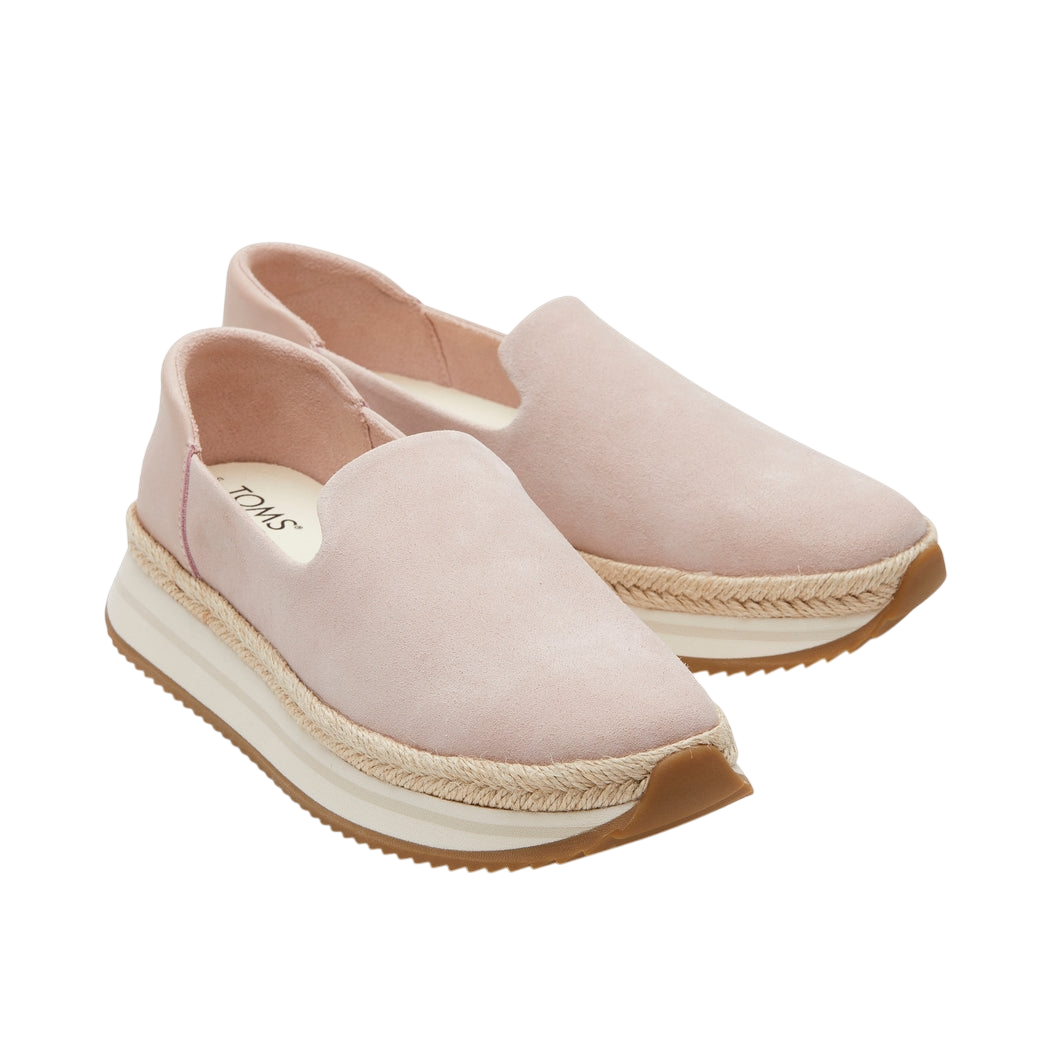 Pink slip-on shoes with a platform design, featuring a suede upper, woven rope detail, and rubber sole.