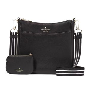 A black Kate Spade crossbody bag with a striped shoulder strap and a matching wallet.