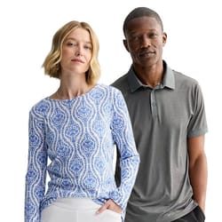 A woman wears a blue patterned long-sleeve shirt, and a man sports a gray short-sleeve polo shirt.