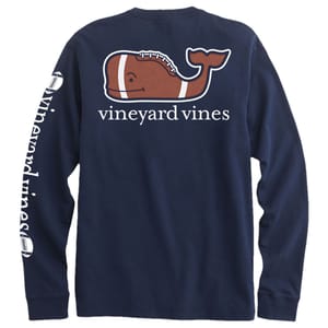 Long-sleeve navy shirt with a football-shaped whale logo on the back and text \“vineyard vines\“ down the sleeve.