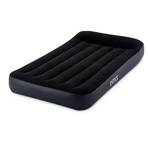 The Intex Air Mattress with Pump is a black inflatable air bed with a built-in pillow and ribbed design for support. The mattress features the Intex logo on its side and is designed for convenience and comfort.