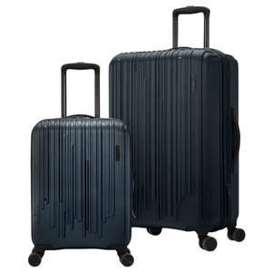 Two dark blue hard-shell suitcases with telescopic handles and spinner wheels, featuring vertical line designs.