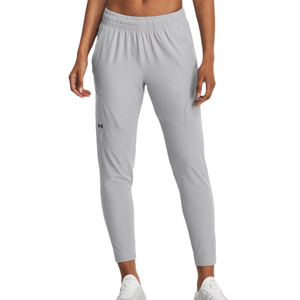 Gray Under Armour pants with an elastic waistband and tapered legs, featuring a small black logo on the left thigh. Designed for athletic use, they have a sleek, fitted look.