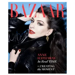 Harper's Bazaar cover featuring a person in a black leather jacket with red lipstick and gold earrings. Text highlights \“Anne Hathaway In Real Time\“ and \“Creating the Moment\“ against a blue background.