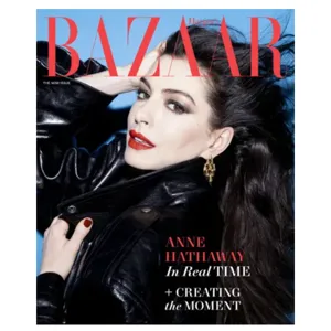 Harper's Bazaar cover featuring a person in a black leather jacket with red lipstick and gold earrings. Text highlights \“Anne Hathaway In Real Time\“ and \“Creating the Moment\“ against a blue background.