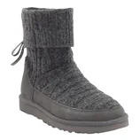 A gray boot featuring a ribbed knit upper and a fold-over cuff with a drawstring detail, paired with a suede-like lower section and a sturdy sole.