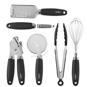A set of kitchen utensils including a grater, peeler, pizza cutter, garlic press, tongs, and a whisk, all with black handles.