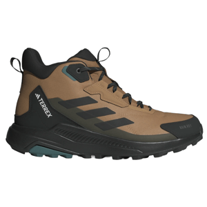 Brown hiking boot with black accents, featuring Adidas Terrex branding and designed for outdoor activities.