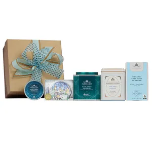 A gift set featuring Harney & Sons Earl Grey teas, including Earl Grey Imperial and Supreme varieties, in various packaging forms.