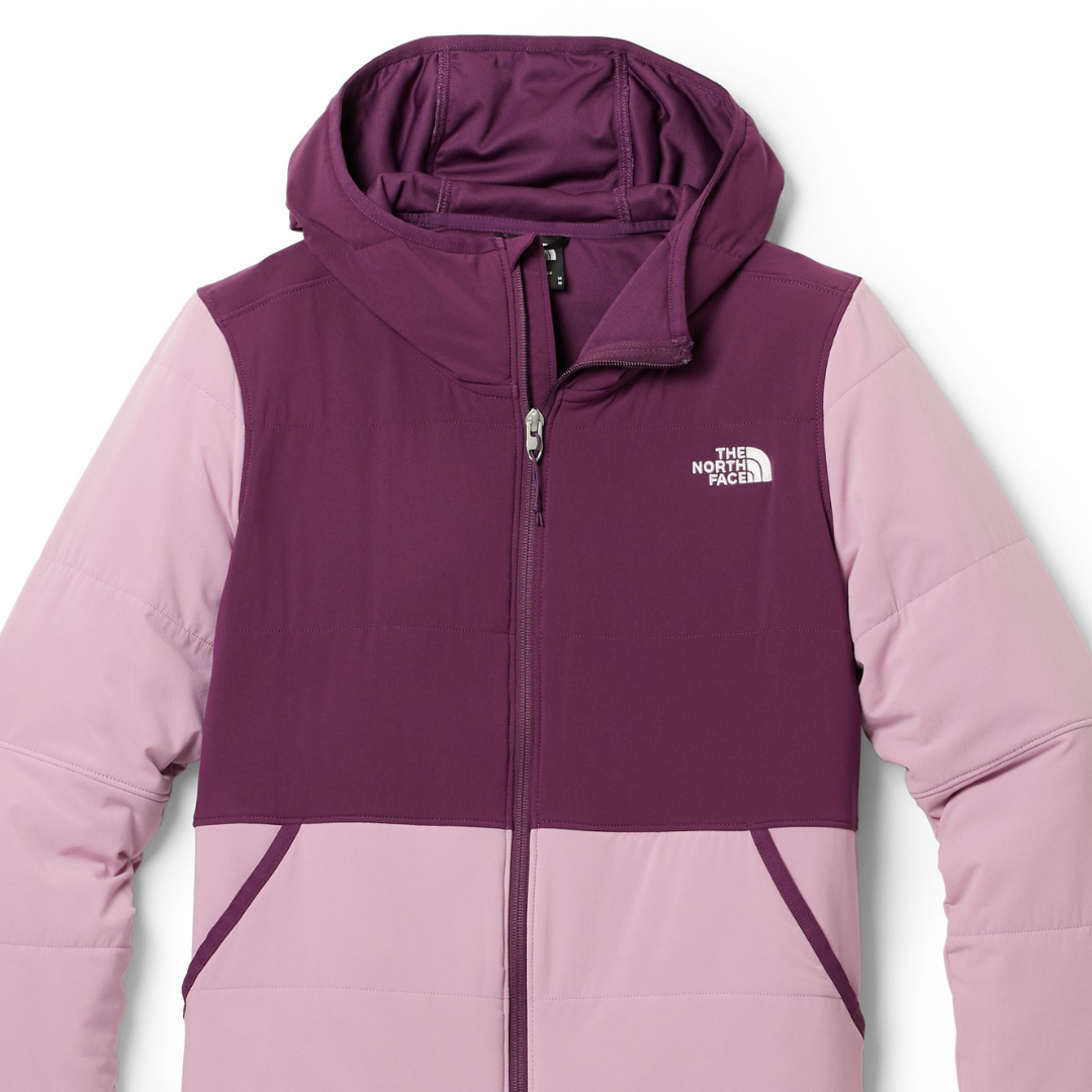 A two-tone purple and pink hooded jacket with a zippered front and side pockets.