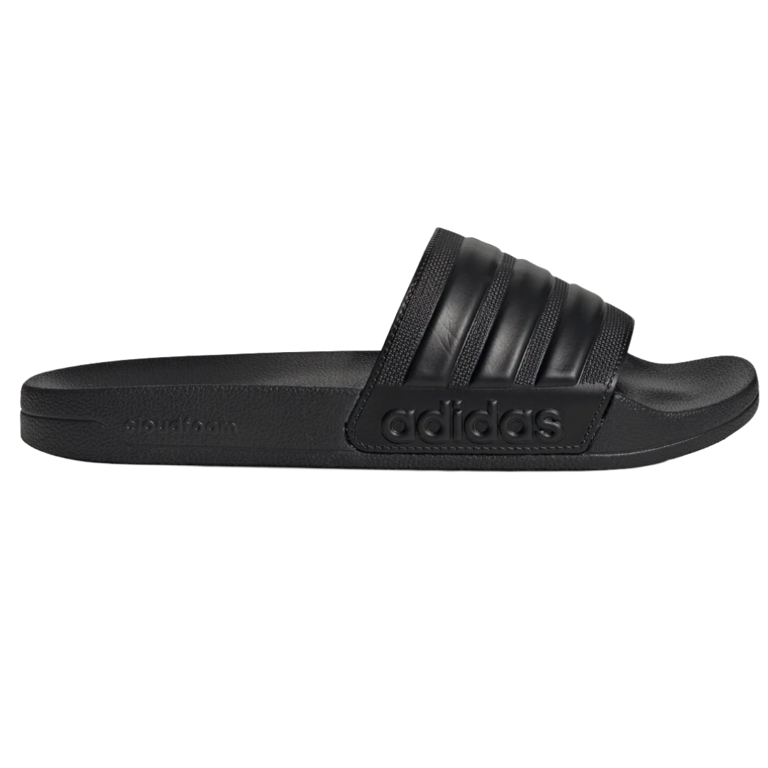 Black Adidas slide sandal with a Cloudfoam footbed. Features a wide strap with the Adidas logo and textured design.