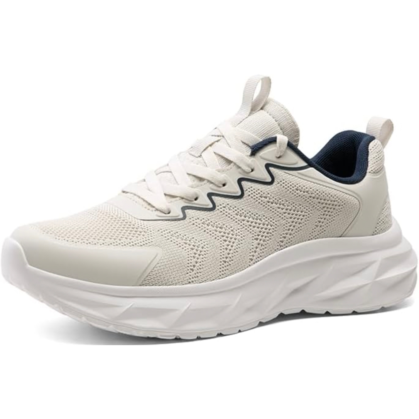 Men's walking sneakers featuring a beige knit upper with navy accents, a cushioned white sole, lace-up design, and pull tabs at the tongue and heel.