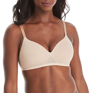 A light beige t-shirt bra with thin, adjustable straps and a triangular mesh detail at the center front.