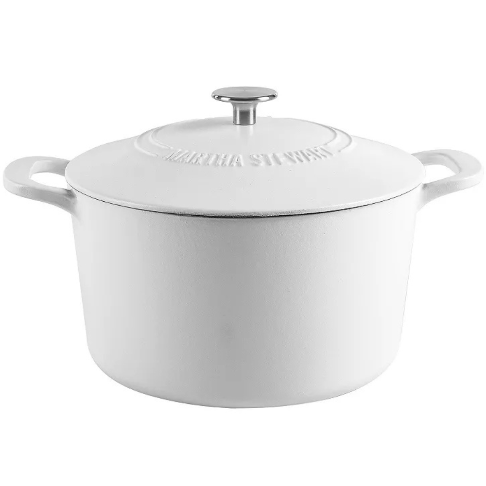 A white cast iron Dutch oven with a lid, featuring a knob handle and embossed text on the top.