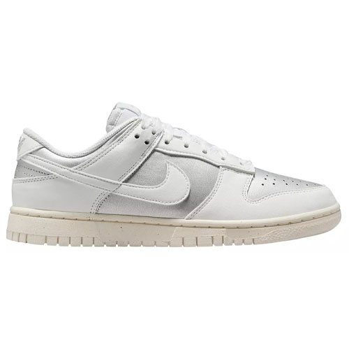 A white Nike Dunk Low sneaker with a leather upper, signature swoosh, and light beige sole.
