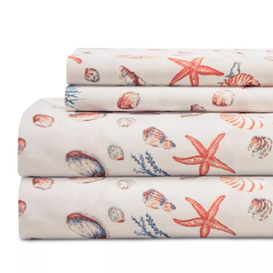 Queen Coastal Printed Sheet Sets feature a nautical theme with designs of seashells, starfish, and coral in soft hues, providing a beach-inspired look.