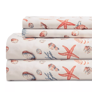 Queen Coastal Printed Sheet Sets feature a nautical theme with designs of seashells, starfish, and coral in soft hues, providing a beach-inspired look.