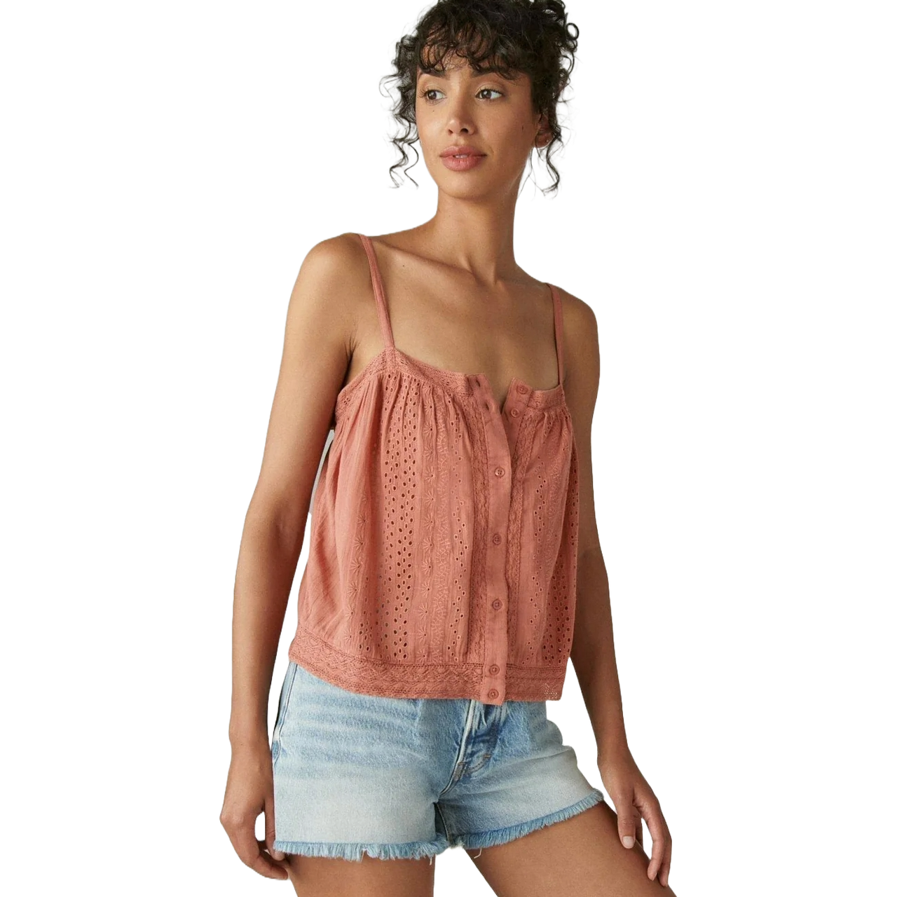 A sleeveless, lace-detailed cami in a dusty pink color with button-front closure, paired with light blue denim cutoff shorts.