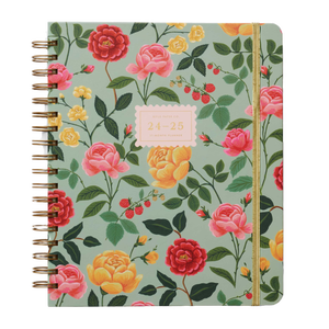 Floral-patterned 24-25 planner with a gold spiral binding and elastic closure, featuring red, pink, and yellow flowers on a light green background.