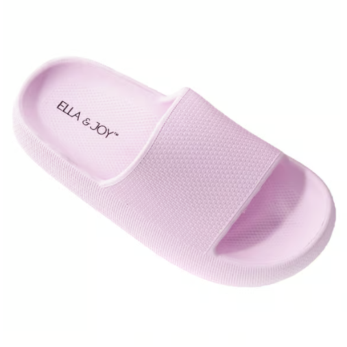 A lavender slide sandal with a textured strap and cushioned insole, featuring the brand \“ELLA & JOY\“.