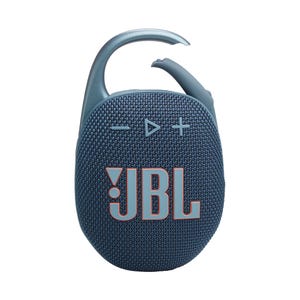 A blue JBL Clip 5 portable Bluetooth speaker with a built-in carabiner, featuring volume controls and a play/pause button on the front.
