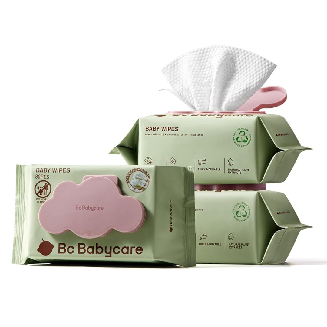 Bc Babycare wipes packaged in green, featuring a cloud-shaped pink lid. Contains 80 pieces, advertised as free from alcohol and synthetic fragrances, and made with natural plant extracts.