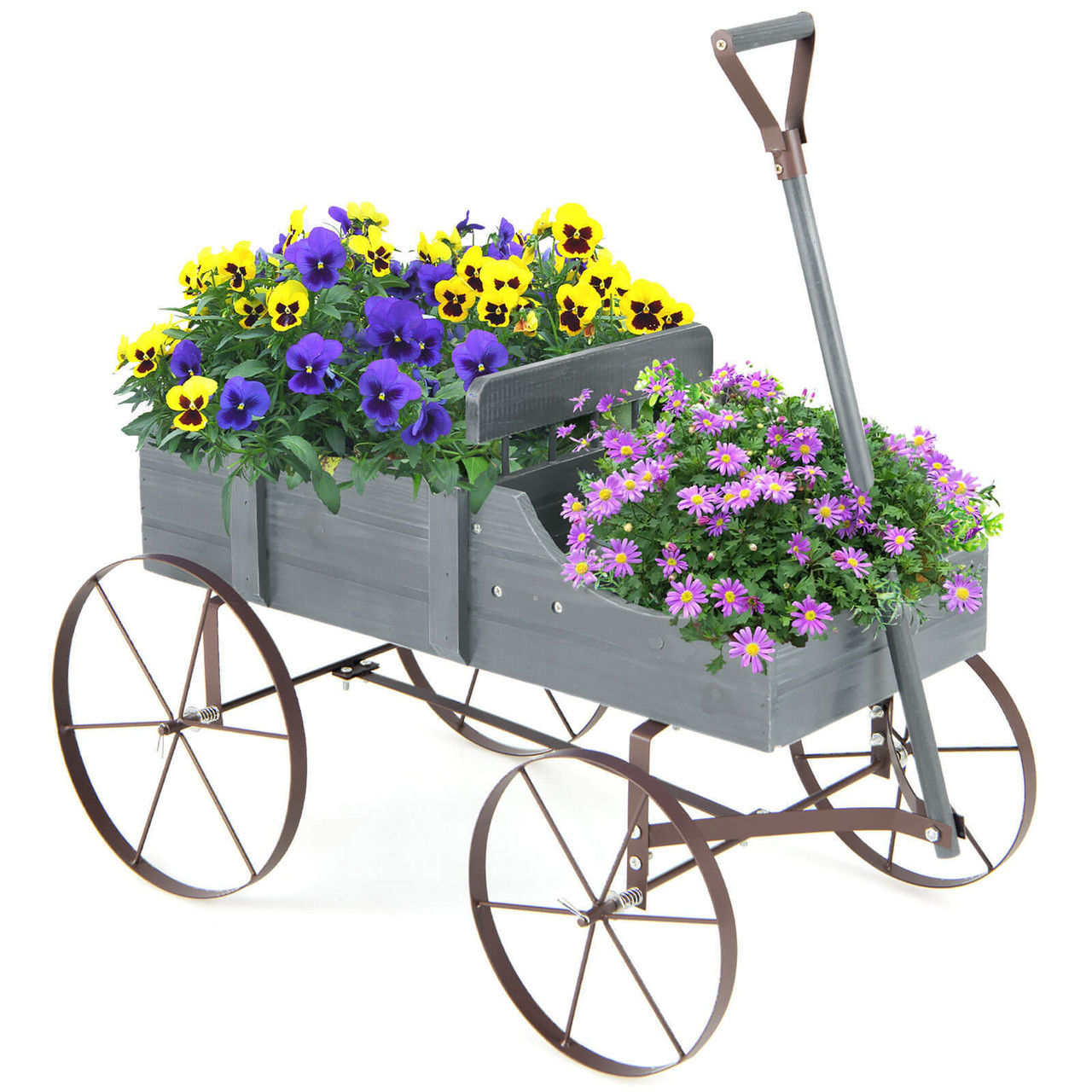 A decorative gray wooden cart with metal wheels, featuring yellow and purple pansies and pink daisy-like flowers, ideal for garden display.
