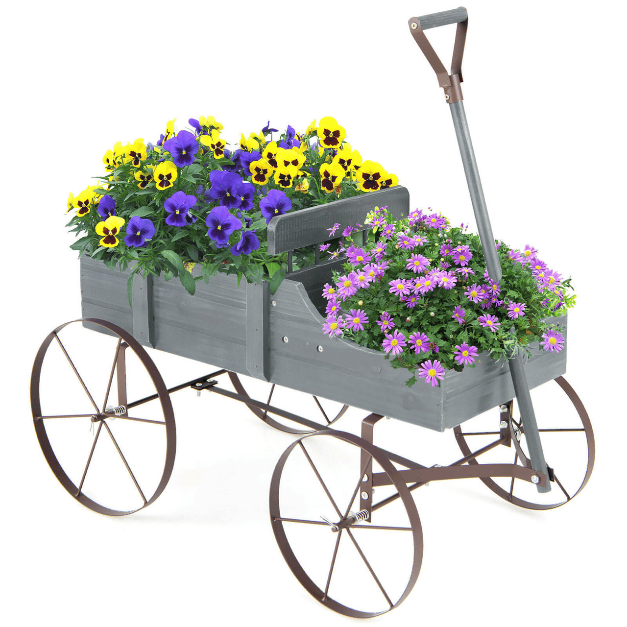 A decorative gray wooden cart with metal wheels, featuring yellow and purple pansies and pink daisy-like flowers, ideal for garden display.