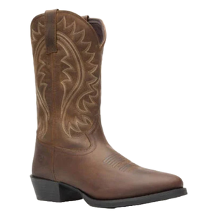 Shyloh Brown Western Boots feature a classic cowboy boot design with intricate embroidery on a tall shaft, brown leather construction, and a pointed toe, complemented by a stacked heel.