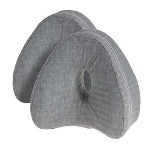 Two gray, contoured knee pillows designed to fit between the knees for support and cooling during sleep. The pillows boast a quilted texture.