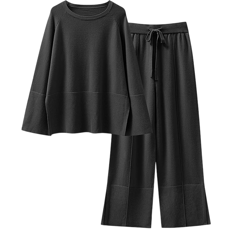 Black knit loungewear set with a loose long-sleeve top and drawstring wide-leg pants, featuring ribbed detailing at the cuffs and hem.