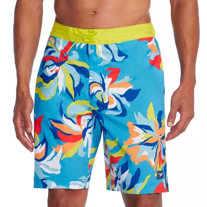 A pair of men's swim shorts with a colorful floral pattern and a bright yellow waistband.