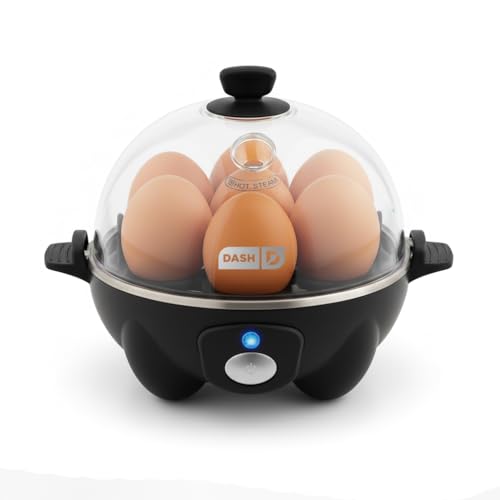 Electric egg cooker with black base and transparent lid, capable of holding seven eggs, with a central power button and LED indicator light.