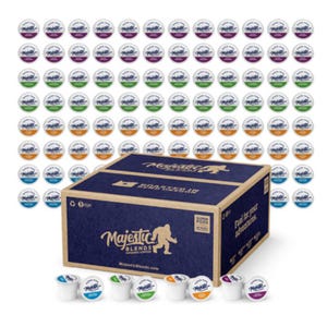 Assorted coffee pods in various flavors displayed around a Majestic Blends branded box.