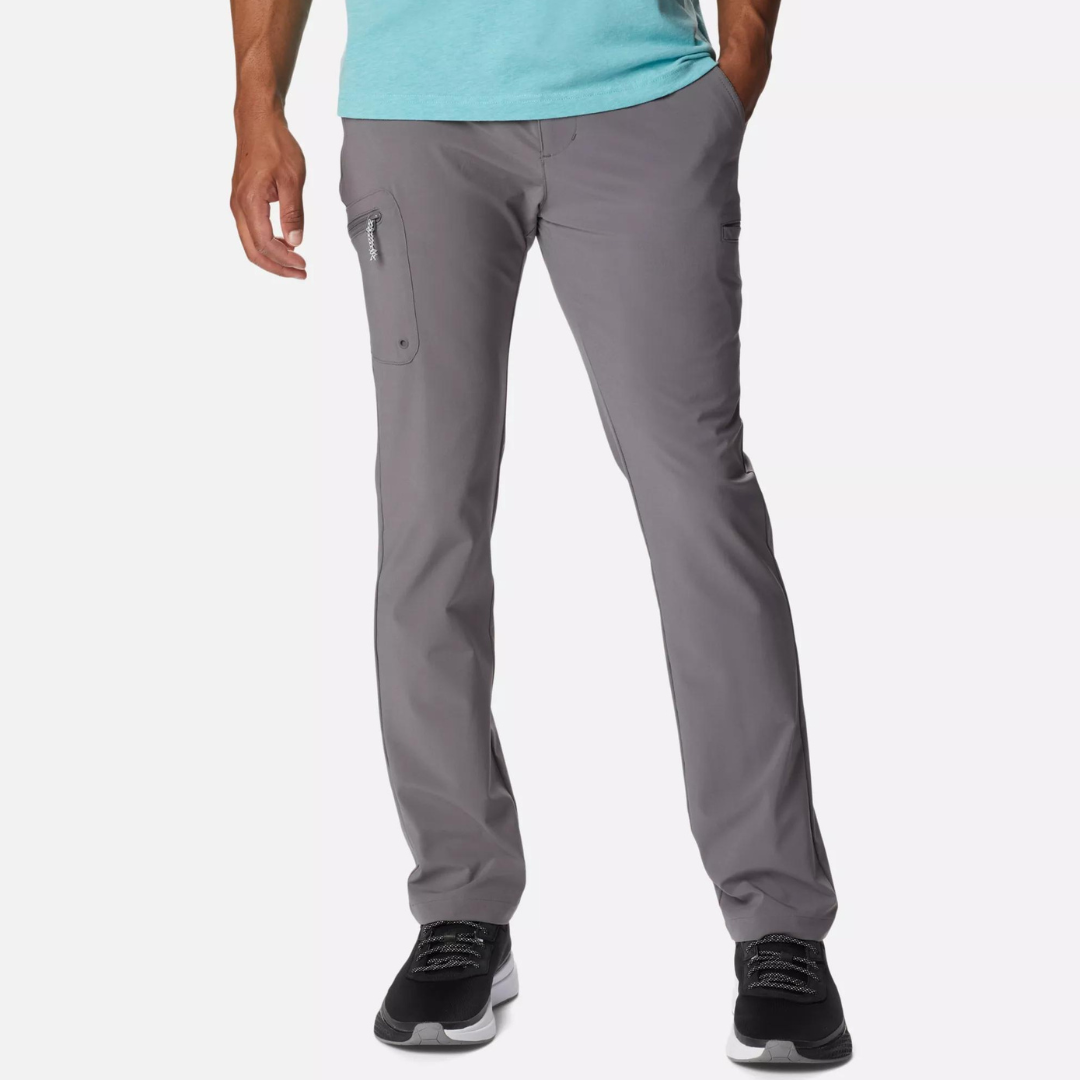 Gray Columbia PFG Terminal Tackle Pants featuring a slim fit with multiple pockets and a partial elastic waist.