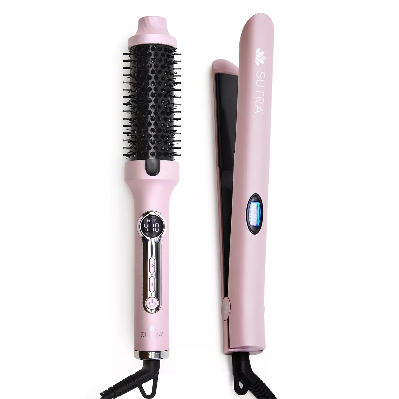 A pink hair styling set featuring a heated round brush and a flat iron, both with digital controls.